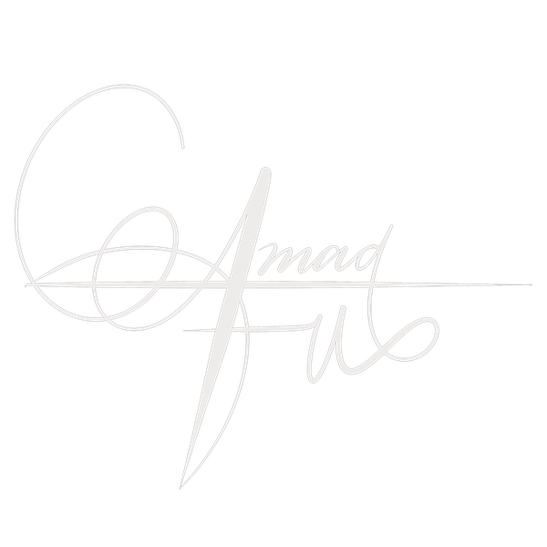 Amad's signature in English and Arabic