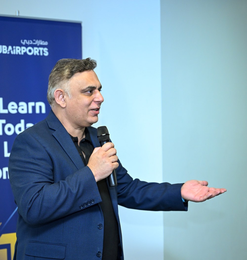 Amad Malik speaking at an aviation technology event in Dubai